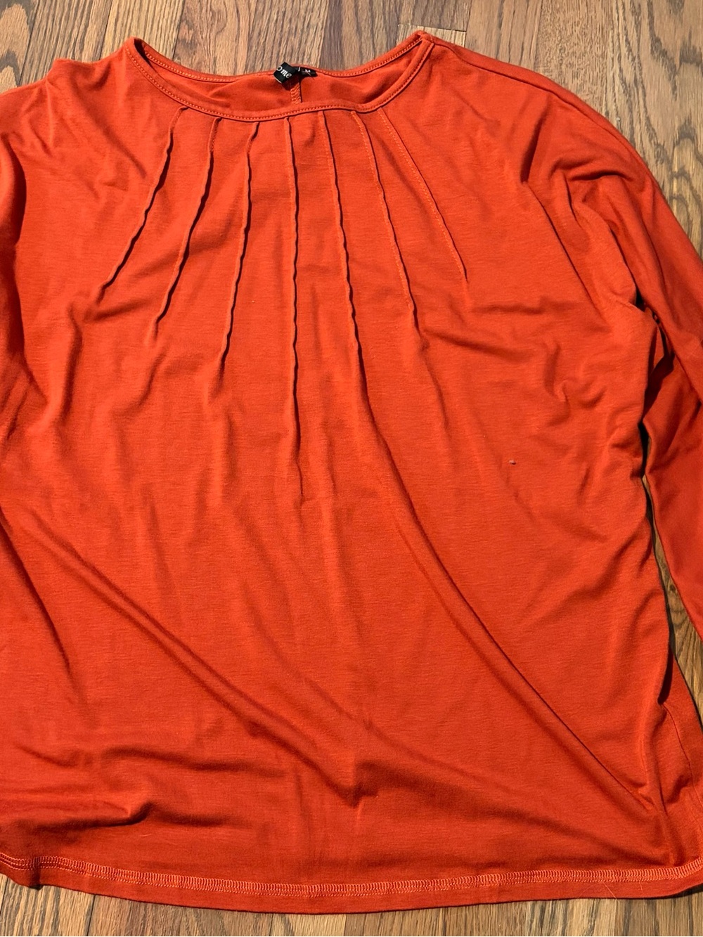 Pleated Crewneck Long-Sleeve Blouse in Vibrant Orange